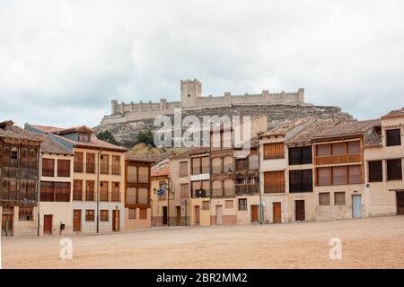 Peñafiel, Spain - April 21, 2019: View of the Plaza del Coso, in Peñafiel. In the background the castle. Its existence is documented since the Middle Stock Photo