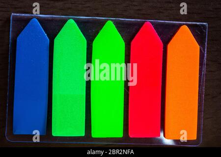 Arrows with luminous color in UV light Stock Photo