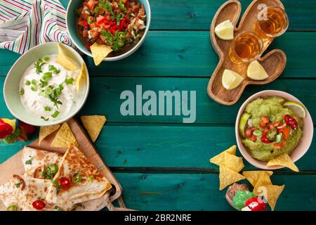 Delicious homemade guacamole and tomato salsa with tortilla chips Stock Photo