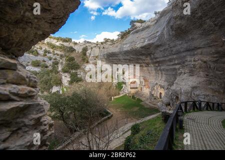 Ojo Guareña, Burgos, Spain - April 30, 2018: The hermitage of San Tirso and San Bernabé is the best-known image of the Ojo Guareña Natural Monument an Stock Photo