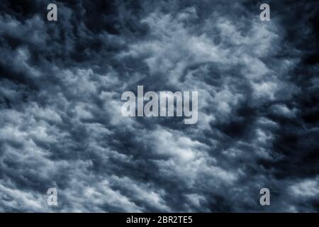 Background Texture of dark ominous storm clouds. Stock Photo