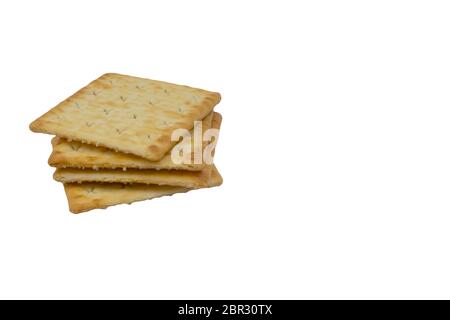 Cracker biscuits over white background. Selective focus Stock Photo