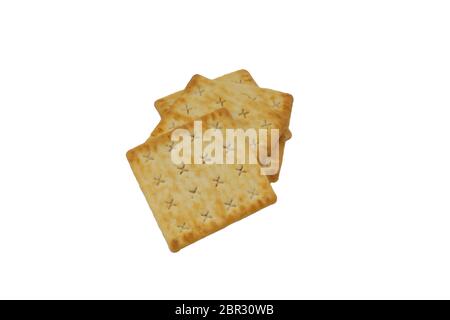 Cracker biscuits over white background. Selective focus Stock Photo