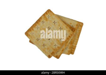 Cracker biscuits over white background. Selective focus Stock Photo