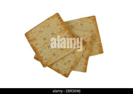 Cracker biscuits over white background. Selective focus Stock Photo