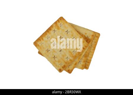 Cracker biscuits over white background. Selective focus Stock Photo