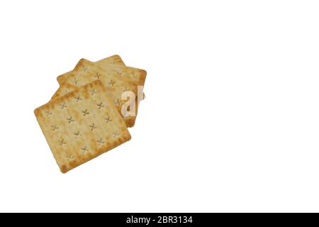 Cracker biscuits over white background. Selective focus Stock Photo