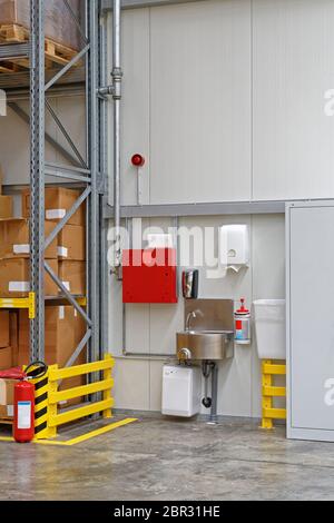 Washing Station Safety Hydrant in Warehouse Factory Stock Photo