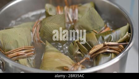 Cooking with rice dumpling Stock Photo