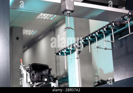 Close up of a 3D dimension measurement plastic parts by CMM, 3D automatic measuring system. Stock Photo