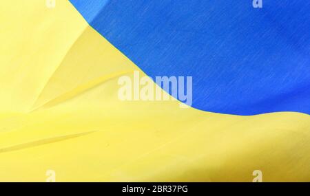 The Flag Of Ukraine Is A Banner Of Two Equally Sized Horizontal Bands Of Blue And Yellow. Stock Photo