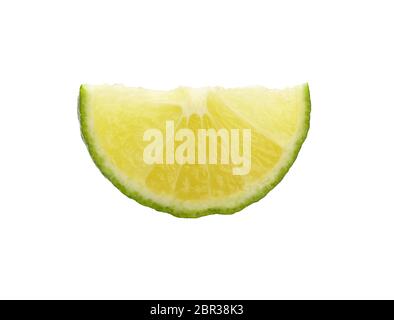 Close up one round thin cut slice of fresh green lime fruit, backlit and isolated on white background Stock Photo