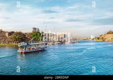 Boat trip on the Nile in Aswan at sunset Stock Photo