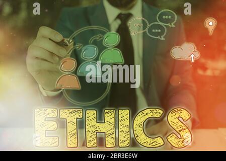 Writing note showing Ethics. Business concept for the moral philosophy or code of morals practiced by an individual Stock Photo