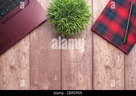high angle view of open notepad and calculator on table  Stock Photo