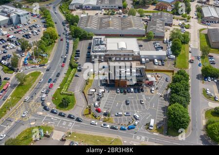 Chelmsford, Essex, UK. 20th May 2020. Cars queue for McDoanlds drive-through in Chelmsford, Essex. The fast food chain opened a limited number of drive-through only restaurants today for the first time since the Coronavirus pandemic forced them to close. Credit: Ricci Fothergill/Alamy Live News Stock Photo