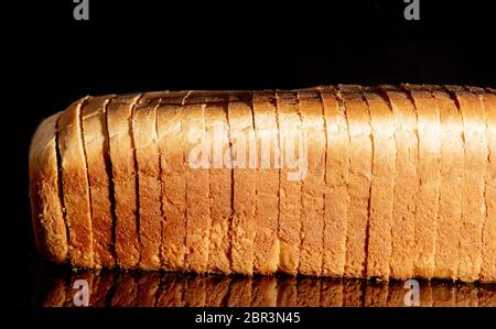 Sliced white bread isolated on black, clipping path included Stock Photo