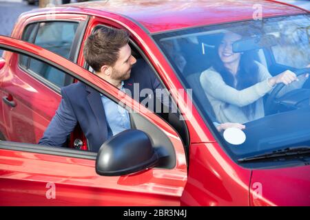 Handsome Man In Suit Getting In Car Stock Photo