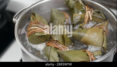 Cooking with rice dumpling Stock Photo