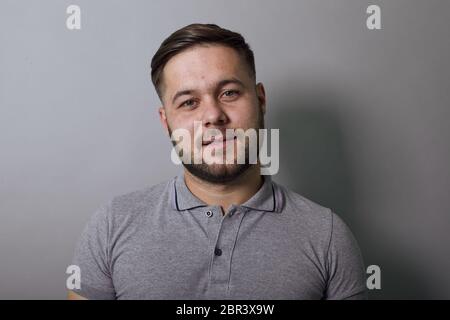 Portrait Of A Serious Man Who Looks Straight At The Camera. Stock Photo