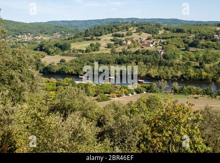 A tourist boats, in French called gabare, on the river Dordogne at La Roque-Gageac, Aquitaine, France Stock Photo