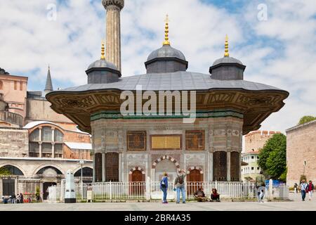 Istanbul, Turkey - May 09 2019: The Fountain of Sultan Ahmed III is a fountain in a Turkish rococo structure in the great square. Stock Photo