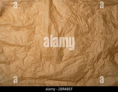 crumpled brown baking parchment paper, full frame Stock Photo - Alamy