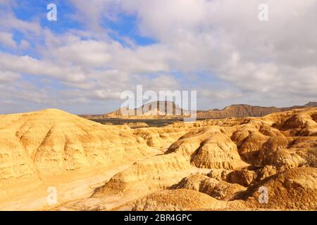 Scenic view towards the fascinating landforms of Pisquerra and erosional features in the foreground in the semi-desert natural region Bardenas Reales Stock Photo
