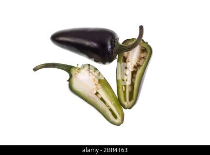 The Purple Jalapeno is a medium sized chili pepper of the species Capsicum annuum, starting off green and maturing to a dark purple color. Stock Photo