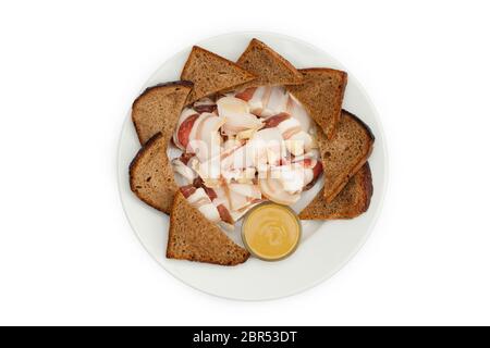 Bread with lard and sauce on a white plate. Photo for the menu Stock Photo