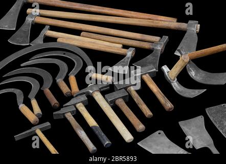 high angle shot of various old tools in black back Stock Photo