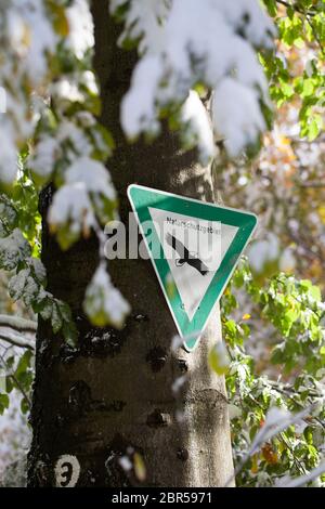German sign 'Naturschutzgebiet' means nature reserve or conservation area in English language Stock Photo