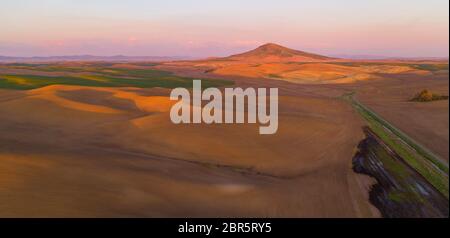 Steptoe Butte State Park is up there somewhere on top of the bluff surrounded by Palouse Country farmland Stock Photo