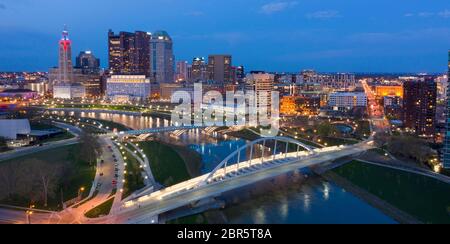 Colorful Lights adorn tall buildings along the waterfront in Columbus Ohio Stock Photo