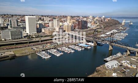 Aerial persepctive over Thea Foss Waterway along the Tacoma waterfront with Commencement Bay Stock Photo