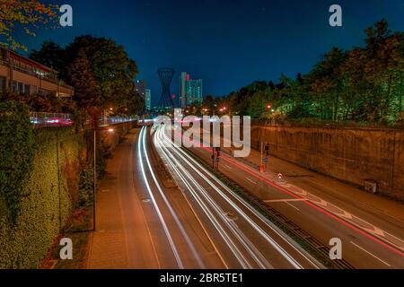 Munich, bavaria, at night. The popular german city as long exposure photography with light trails of driving cars and famous architecture at the Stock Photo