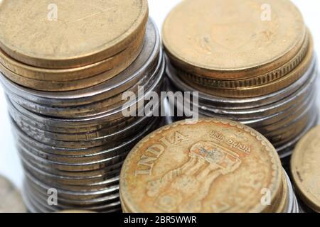 Stock pile of Hundred number 5 five Indian rupee metal coin currency. Top View. Financial, economy, investment concept. Banking and exchange object. Stock Photo
