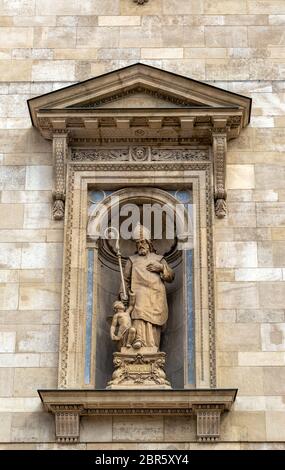 Statue of St. Augustine on the side of St. Stephens Basilica in Budapest, Hungary Stock Photo