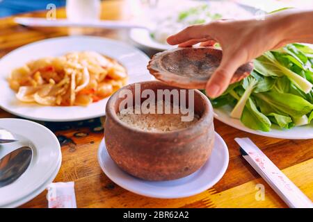 Vietnamese seafood in a pot boiling with crab and spices yummy Stock Photo