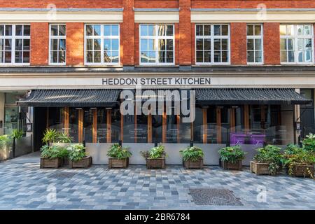 Heddon Street Kitchen, part of the Gordon Ramsay restaurant empire seen in London.According to documents filed with Companies House, the star worth around £185 million has registered charges with Barclays bank against 16 firms to secure the future of his restaurants during the coronavirus crisis. Gordon Ramsay takes out bumper loans to secure the future of his restaurant empire. Stock Photo