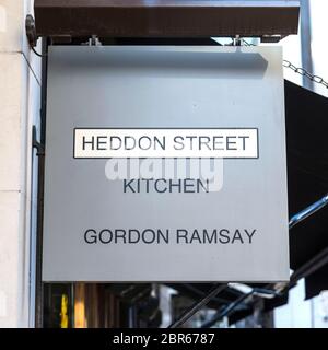 Heddon Street Kitchen logo, part of the Gordon Ramsay restaurant empire seen in London.According to documents filed with Companies House, the star worth around £185 million has registered charges with Barclays bank against 16 firms to secure the future of his restaurants during the coronavirus crisis. Gordon Ramsay takes out bumper loans to secure the future of his restaurant empire. Stock Photo