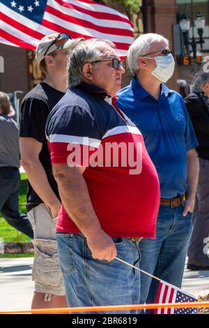 Lansing, Michigan, USA. 20th May, 2020. A protest at the Michigan State Capitol against Governor Gretchen Whitmer's emergency orders closing many businesses during the coronavirus pandemic. Credit: Jim West/Alamy Live News Stock Photo