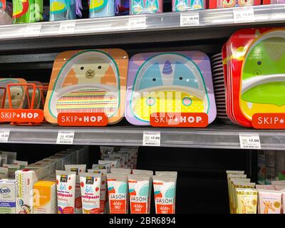 Orlando,FL/USA-5/3/20: A display of various children's plates and utensils in the baby department of a Whole Foods Market Grocery Store. Stock Photo