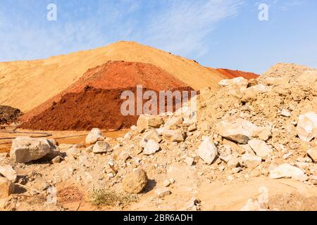 Earth sand rocks soil colors on construction landscape embankment Stock Photo