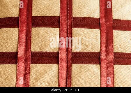 Close up Abstract of silk or satin fabric background of linen cloth textile of red fabric with crisscross diagonal pattern for any occasion. Natural c Stock Photo