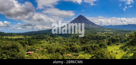 Panoramic view of Arenal Volcano and lake in central Costa Rica Stock Photo