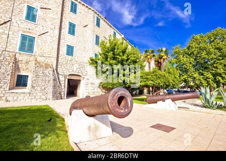 Town of Sibenik historic architecture and iron cannon view, Dalmatia region of Croatia Stock Photo