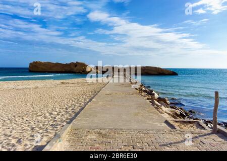 Landscape of the Al Qurayyah beach with the background of the Mediterrenean sea in Monastir, Tunisia Stock Photo