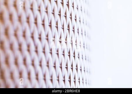 White wicker pattern, plastic furniture surface, background photo with selective soft focus Stock Photo