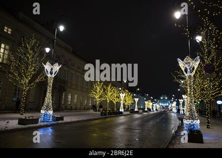 Nowy Swiat (New World) street in Warsaw, winter time. Everything is lightning. Stock Photo